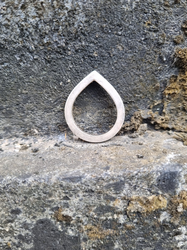 Tear drop stacker ring